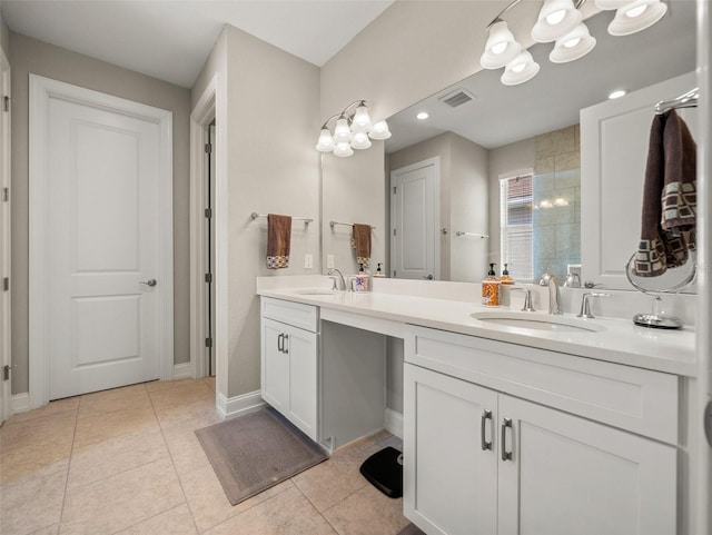 bathroom with vanity and tile patterned floors