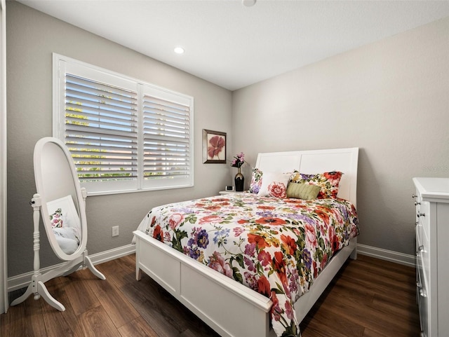 bedroom featuring dark hardwood / wood-style floors