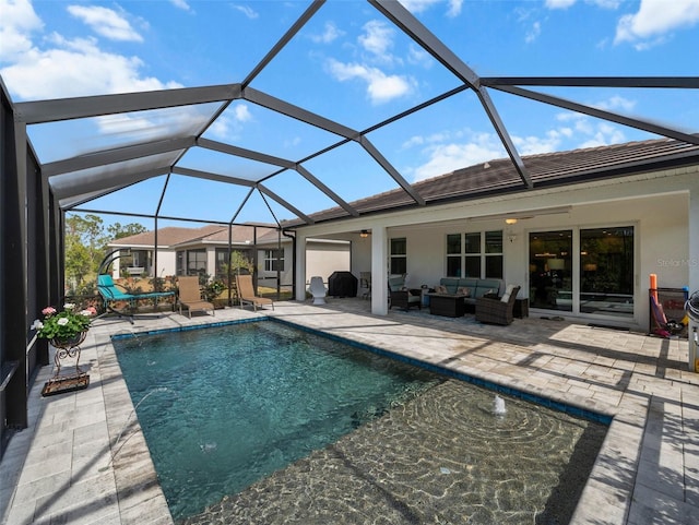 view of swimming pool featuring an outdoor hangout area, a patio, and a lanai