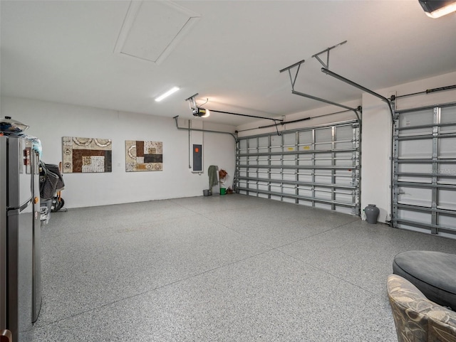 garage with a garage door opener, stainless steel fridge, and electric panel