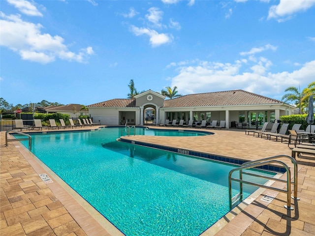 view of swimming pool with a patio