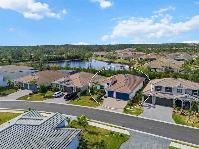 aerial view featuring a water view