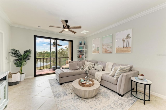 living room featuring ceiling fan, ornamental molding, and light tile patterned floors