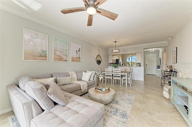 living room featuring crown molding, ceiling fan, and light tile patterned flooring