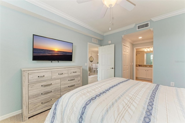 bedroom featuring ceiling fan, ensuite bath, ornamental molding, and light carpet