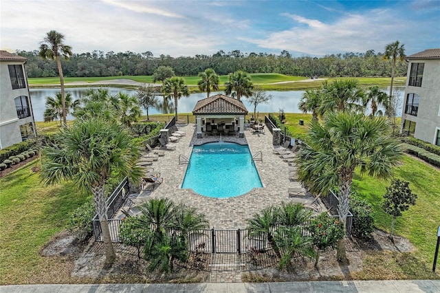 view of swimming pool featuring a gazebo, a patio, and a water view