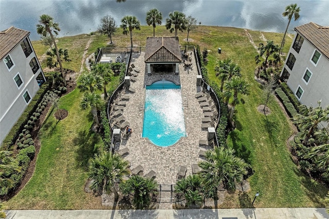 view of pool featuring a water view