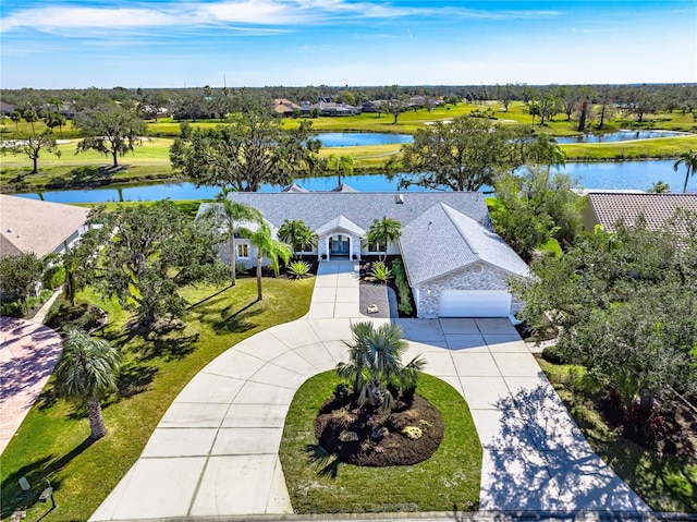 birds eye view of property featuring a water view