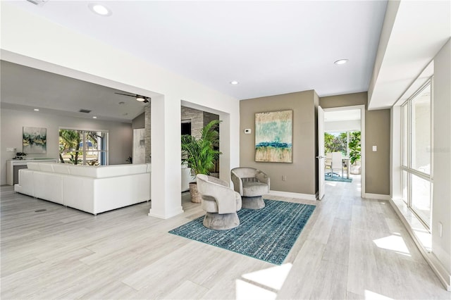 living room featuring light wood-type flooring