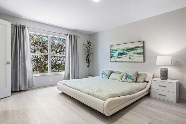 bedroom featuring light hardwood / wood-style floors