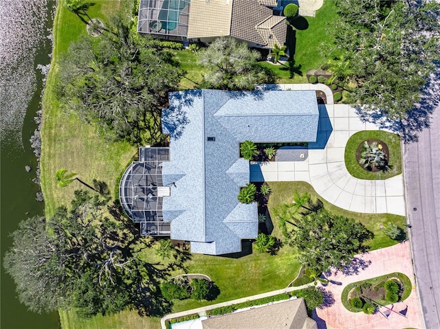 drone / aerial view with a water view