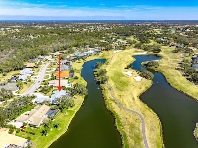 bird's eye view with a water view