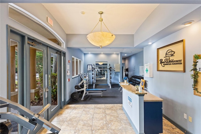 exercise room with french doors