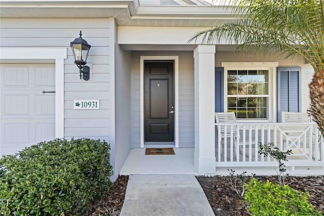 property entrance featuring a garage