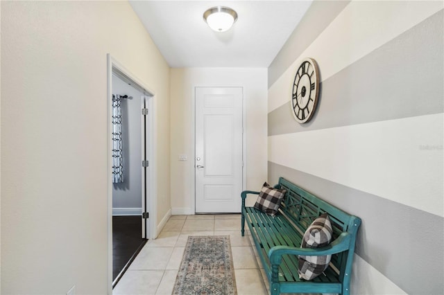 hallway with light tile patterned flooring