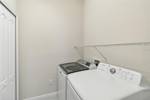 laundry area featuring independent washer and dryer