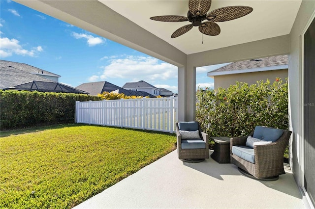 view of patio with ceiling fan