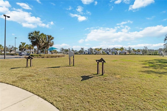 view of community featuring a lawn