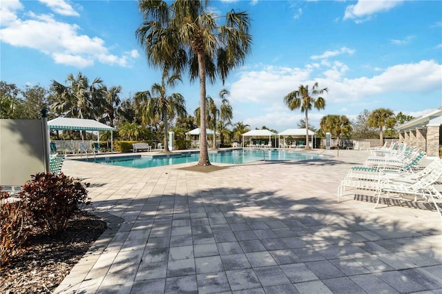 view of pool with a gazebo and a patio area