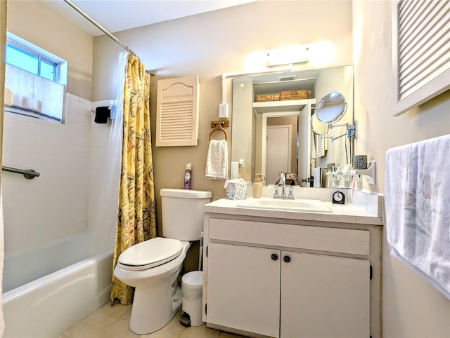 full bathroom with tile patterned flooring, shower / bath combo, vanity, and toilet