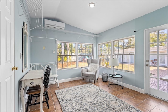 office space featuring tile patterned flooring, a wall mounted AC, and vaulted ceiling