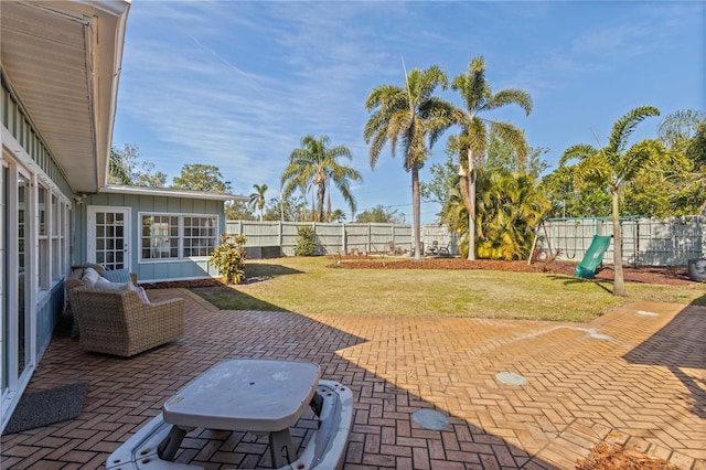 view of patio with a playground