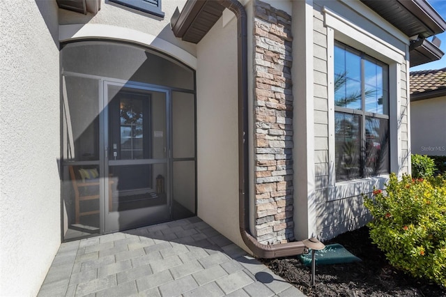 5035 Seafoam Trl, Bradenton, FL 34211 - property entrance featuring stucco siding and stone siding