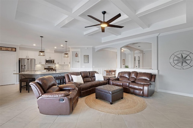5035 Seafoam Trl, Bradenton, FL 34211 - living room featuring a ceiling fan, arched walkways, coffered ceiling, beam ceiling, and recessed lighting