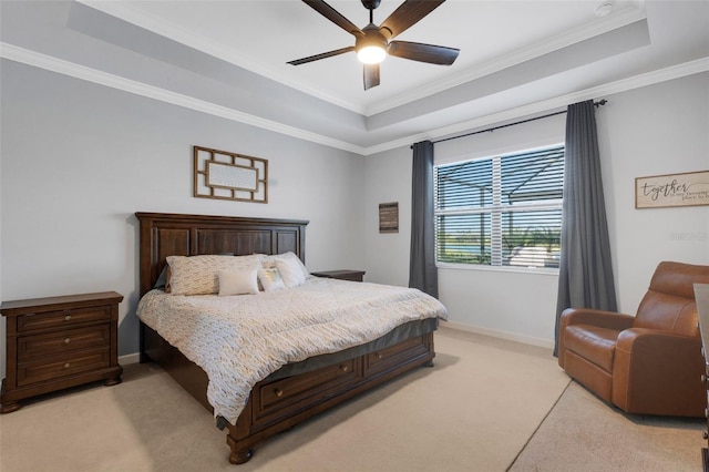 5035 Seafoam Trl, Bradenton, FL 34211 - bedroom featuring a tray ceiling, light carpet, ornamental molding, baseboards, and a ceiling fan