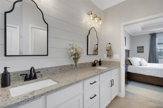 5035 Seafoam Trl, Bradenton, FL 34211 - bathroom featuring ornamental molding, double vanity, connected bathroom, and tile patterned flooring
