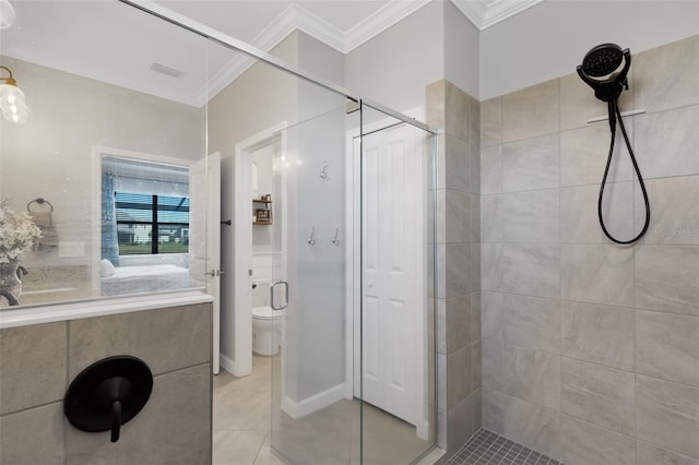 5035 Seafoam Trl, Bradenton, FL 34211 - bathroom featuring ornamental molding, a stall shower, toilet, tile patterned flooring, and vanity