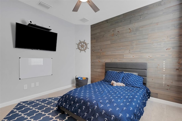 5035 Seafoam Trl, Bradenton, FL 34211 - carpeted bedroom featuring baseboards, wooden walls, and ceiling fan