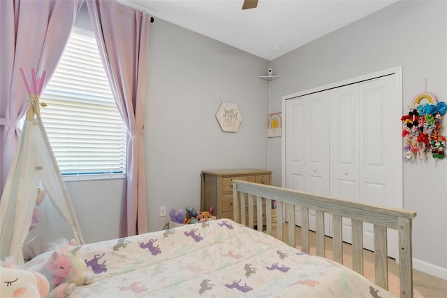5035 Seafoam Trl, Bradenton, FL 34211 - bedroom featuring a closet, ceiling fan, and carpet