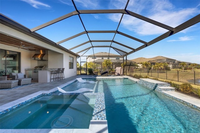 5035 Seafoam Trl, Bradenton, FL 34211 - view of swimming pool featuring a patio area, a pool with connected hot tub, glass enclosure, and a bar