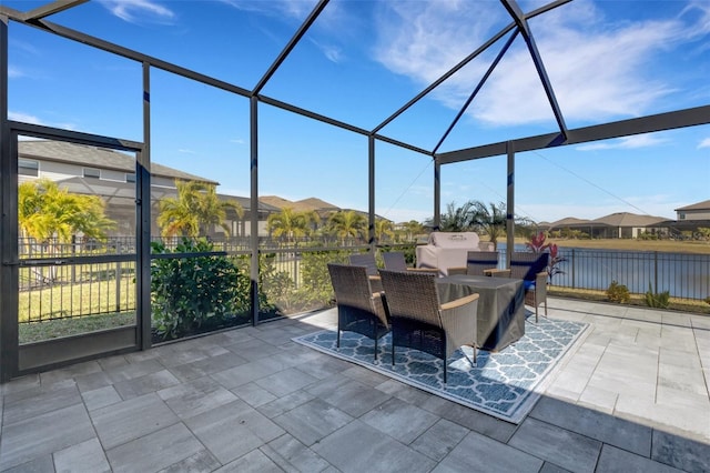5035 Seafoam Trl, Bradenton, FL 34211 - view of patio featuring a lanai, a residential view, grilling area, and outdoor dining area