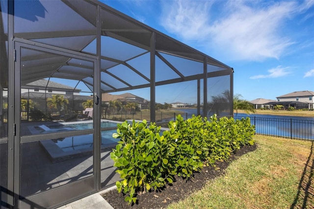 5035 Seafoam Trl, Bradenton, FL 34211 - view of pool with glass enclosure, a water view, and a residential view