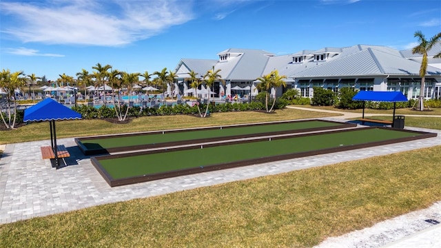 5035 Seafoam Trl, Bradenton, FL 34211 - surrounding community with a bocce ball area, a residential view, and a lawn