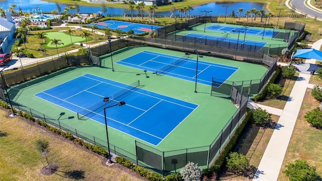 5035 Seafoam Trl, Bradenton, FL 34211 - view of tennis court featuring a water view