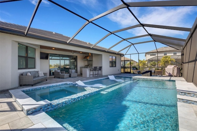 5035 Seafoam Trl, Bradenton, FL 34211 - view of pool with outdoor lounge area, a pool with connected hot tub, a patio area, a ceiling fan, and glass enclosure
