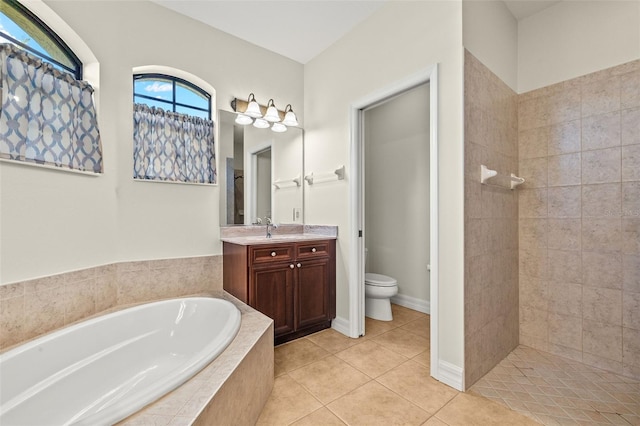 full bathroom featuring vanity, separate shower and tub, tile patterned floors, and toilet