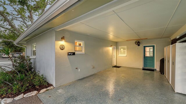 exterior space featuring stucco siding