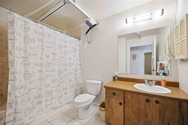 bathroom featuring vanity, tile patterned floors, toilet, and a shower with shower curtain