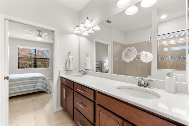 bathroom featuring ceiling fan, vanity, and tile patterned floors