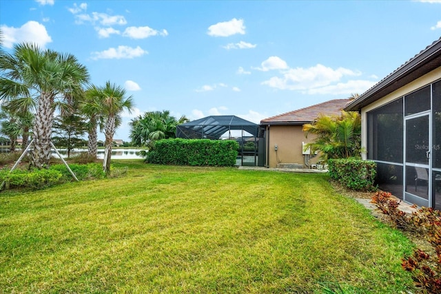 view of yard with a lanai