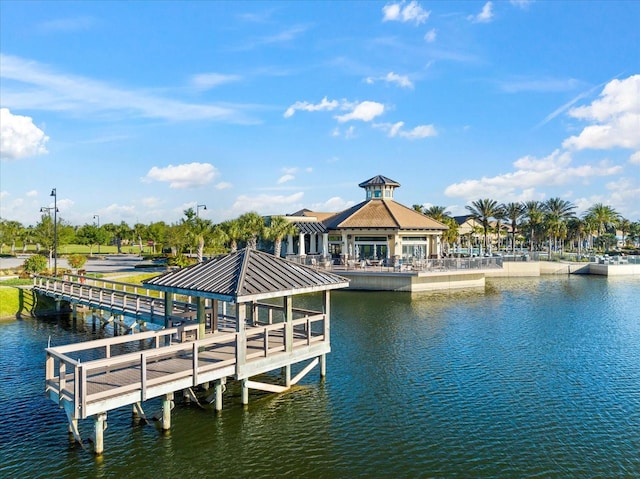 view of dock with a water view and a gazebo