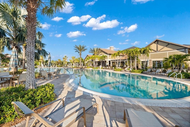 view of swimming pool with a patio