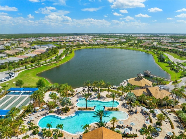 drone / aerial view with a water view