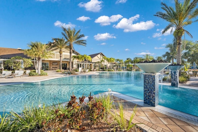 view of swimming pool with a patio area