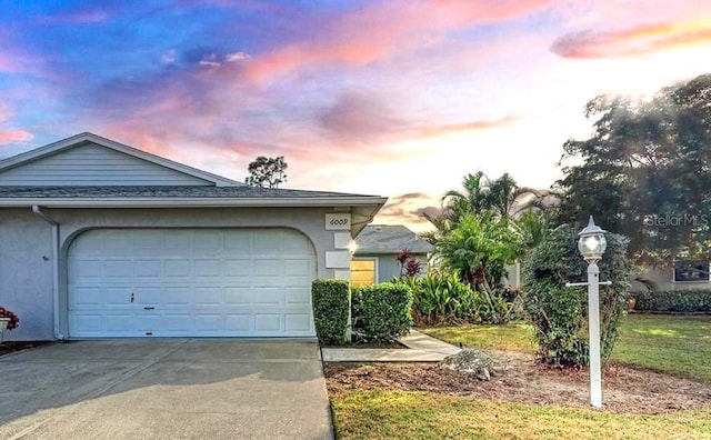 exterior space featuring concrete driveway