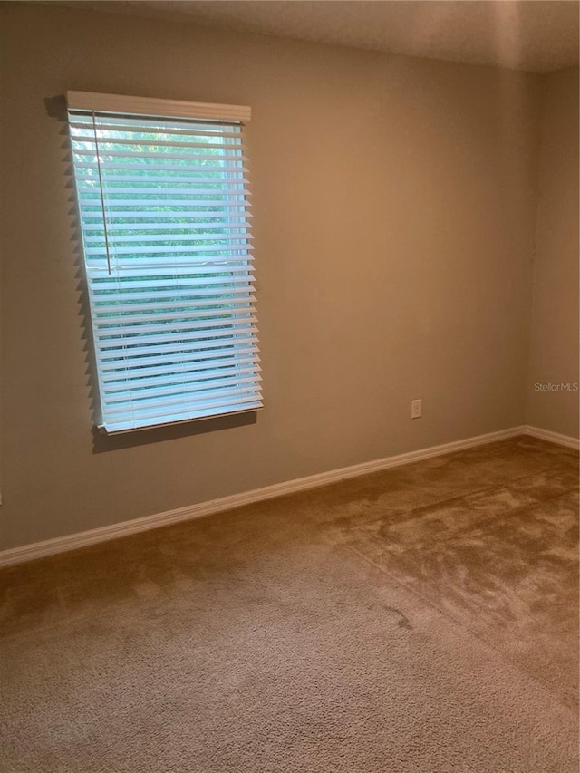 view of carpeted spare room